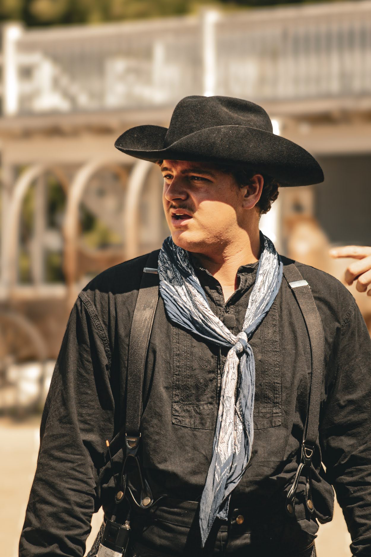 Nicolas in a Western costume and cowboy hat