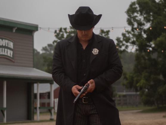 Nicolas in a detailed Western costume